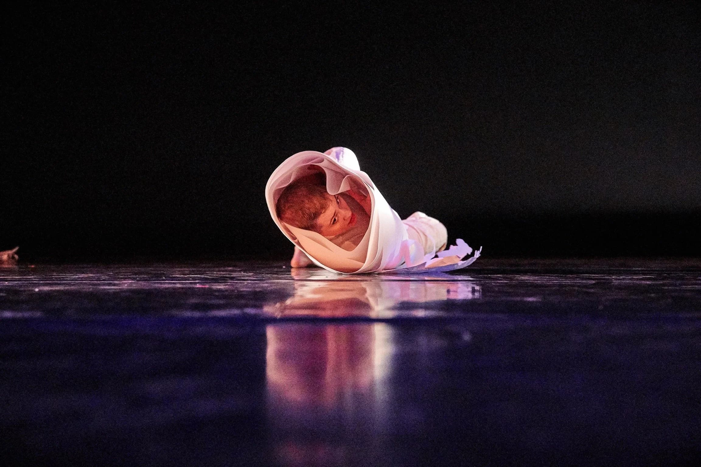 Contemporary dance performance with fabric